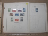 National Parks Issue US postage stamps from 1934 and 1935, on display pages. Stamps feature Yosemite