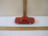 Red 1962 Chevy Corvair 2-Door Sedan Promo Model Car with red interior, 6 oz