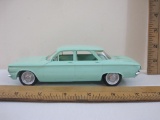 1961 Chevy Corvair Turquoise 4-Door Sedan Promo Model Car with matching interior, 7 oz