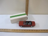 1964 Ember Red Chevrolet Corvair Convertible Promo Model Car with black and grey interior, 5 oz