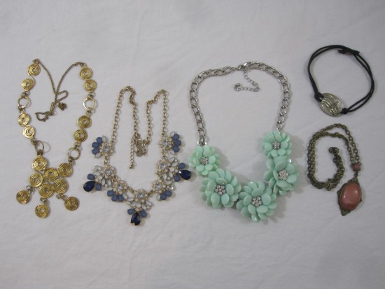 Lot of Fashion Jewelry including Gold Tone Swirl Necklace, Floral necklaces, and more, 7 oz