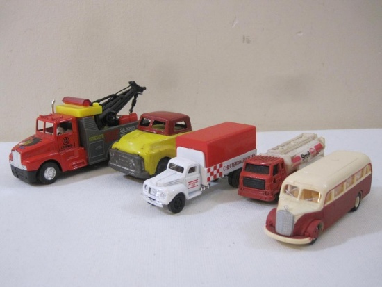 Five Miniature Vehicles including Golden Checkerboard Feeds, Lucky Inc Shell Tanker, and 9 oz