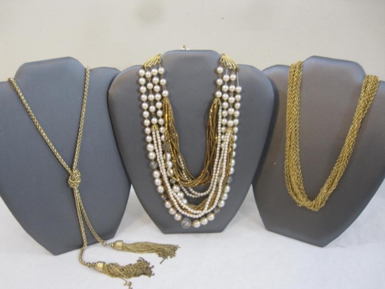 Three Gold Tone Necklaces including necklace with 2 chain tassels and more, 8 oz