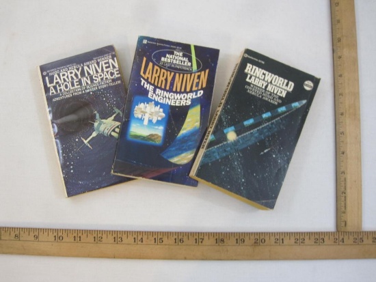 Three Larry Niven Science Fiction Books including A Hole in Space (1974), The Ring World Engineers