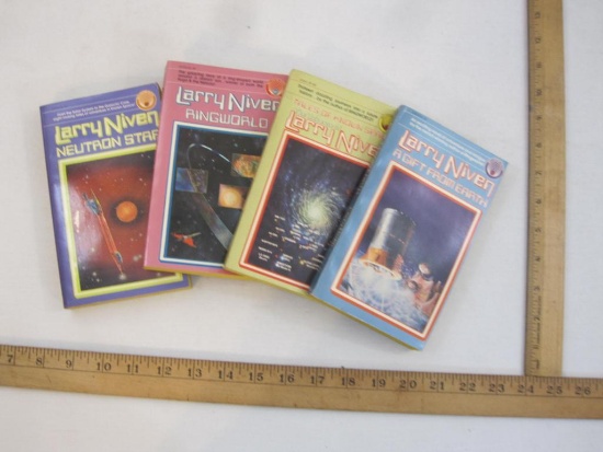 Four Vintage Science Fiction Books by Larry Niven including Neutron Star (1975), Ringworld (1975),