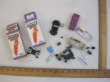 Two Xlerators Powerpulse Controls for Slot Cars in original boxes and assorted car pieces, 11 oz