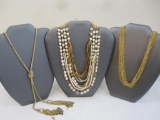 Three Gold Tone Necklaces including necklace with 2 chain tassels and more, 8 oz