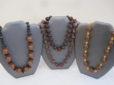 Four Brown and Black Beaded Necklaces, 9 oz