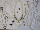 Lot of Black and White Jewelry including ceramic shell necklace and earring set with faux pearls, 1
