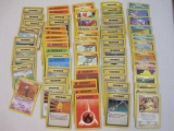 Lot of Assorted Pokemon Trading Cards including Machop, Abra, Mewtwo, and more, cards have wear (see