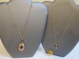 Two Avon Gold Tone Necklaces including President's Club Locket with purple accent, black and clear