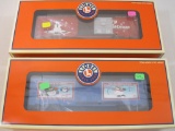 Two Lionel Christmas Boxcars including Christmas Box Car 02 6-36243 and 2003 Christmas Boxcar
