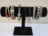 Lot of 5 Bracelets including wrap, bangle and wooden beads, 4 oz