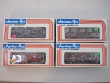 Four American Flyer New York Central Train Cars including New York Central 3-Dome Tank Car 4-9106,