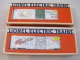 Two Lionel Christmas Boxcars including 1989 Christmas Car 6-19908 and 1990 