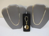 Lot of Gold Tone Jewelry including 2 necklaces and fob
