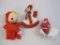 Three Vintage Christmas Items including molded plastic Santa and sleigh, Japan knee hugging elf, and