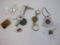 Lot of Assorted Men's Jewelry Items including North American Fishing Club Pendant, souvenir