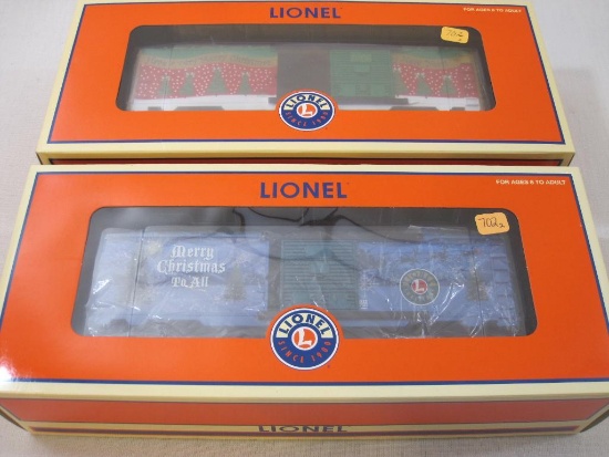 Two Lionel Christmas Box Cars including 2006 Christmas Boxcar 6-25008 and 2007 Christmas Boxcar