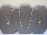Four Gold Tone Necklaces including Avon leaves, snowflake pendant and more, 1 oz