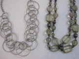 Two Silver Tone Necklaces including two-strand with clear acrylic beads, 7 oz
