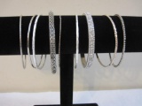 Nine Silver Tone Bangle Bracelets, 3 oz