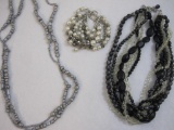 Three Pieces of Beaded Jewelry including multi-strand necklace, multi-strand bracelet and long gray