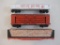 Three HO Scale Southern Pacific Train Cars including Gondola, Flat Car with Load and Boxcar from