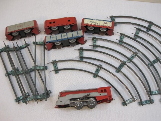 Vintage Metal Hafner Streamliner Mechanical Train Set with metal track, locomotive, tender, and