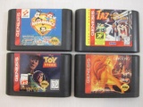 Four Vintage Sega Genesis Game Cartridges including Animaniacs, Taz in Escape from Mars, Toy Story,