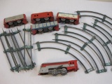 Vintage Metal Hafner Streamliner Mechanical Train Set with metal track, locomotive, tender, and