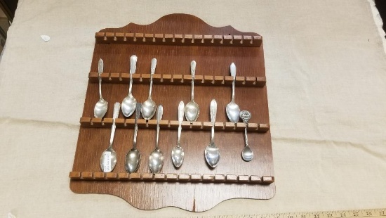 Wooden Display Rack, complete with 11 Spoons, Some Silver plate