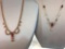 Two Red Stone Accented Necklaces including gold tone red rhinestone bow and silver tone with red