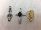 Three Religious Pins and Pendants including sterling silver saint pendant (2.2 g), silver tone cross