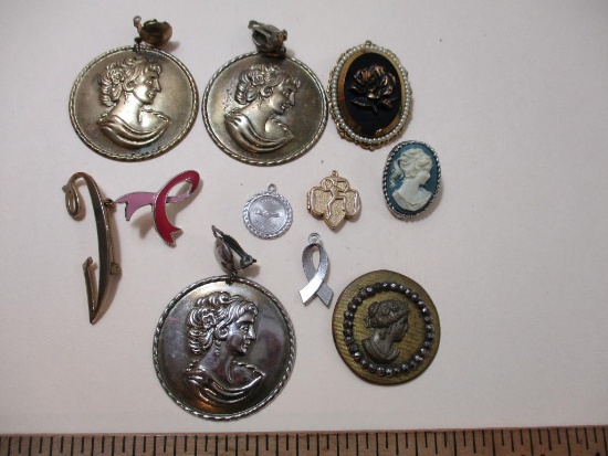 Costume Jewelry including cameo pin and Girl Scout locket, 3 oz