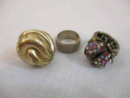 Three Gold Tone Rings including Colorful Rhinestone Ladybug Stretch Ring and two size 6, 2 oz