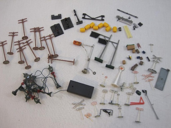 Lot of Assorted Train Accessories including street signs, utility poles, battery-operated street