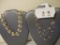 Two Necklaces including pink and white floral and new beaded necklace and earring set, 4 oz