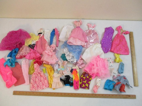 Lot of Vintage Barbie and Assorted Doll Clothes including many Barbie licensed pieces, see pictures