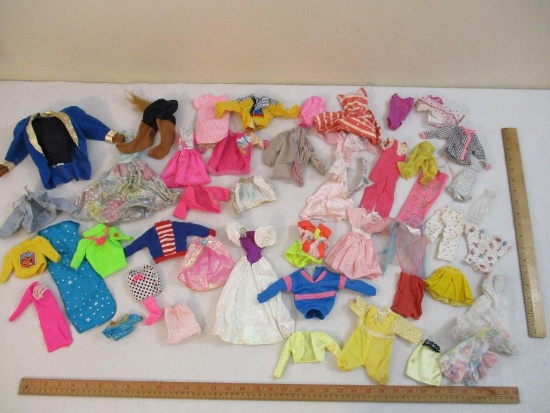 Lot of Vintage Barbie and Assorted Doll Clothes including many Barbie licensed pieces and Mattel Ken