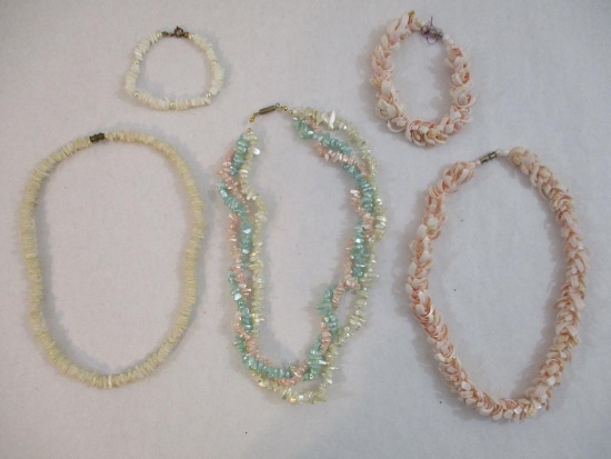 Lot of Shell Jewelry including matching pink necklace and earring set, multi-strand pink/blue/white