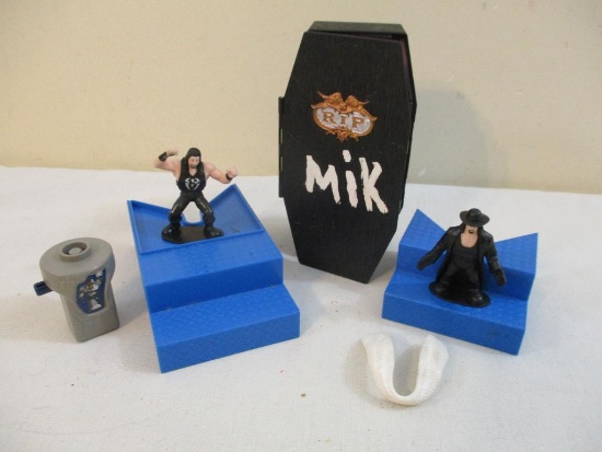 Lot of Wrestling Figures and Toys including Undertaker and Roman Reigns, 14 oz