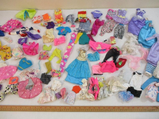 Lot of Vintage Barbie and Assorted Doll Clothes including many Barbie licensed pieces, see pictures