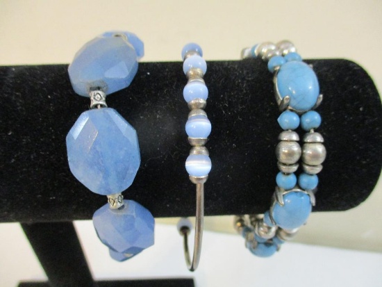 Three Silver Tone and Blue Bracelets including sterling silver beaded bracelet, blue glass beaded