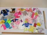 Lot of Vintage Barbie and Assorted Doll Clothes including many Barbie licensed pieces and Mattel Ken