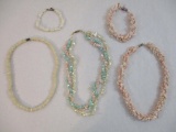 Lot of Shell Jewelry including matching pink necklace and earring set, multi-strand pink/blue/white