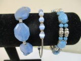 Three Silver Tone and Blue Bracelets including sterling silver beaded bracelet, blue glass beaded