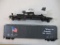 Two HO Scale Train Cars including SML 7493 Boxcar and Nickle Plate Road Flatcar with seaplane load,