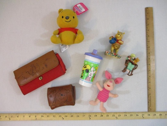Lot of Winnie the Pooh Items including wallets, plush, Tigger Tupperware cup and more, 2 lbs