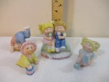 Four 1980s Cabbage Patch Kids Porcelain Figurines including Be My Sweetheart!, most marked 1984 OAA,